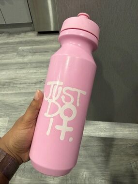 Nike Pink Sports Water Bottle with White 'Just Do It.' Logo